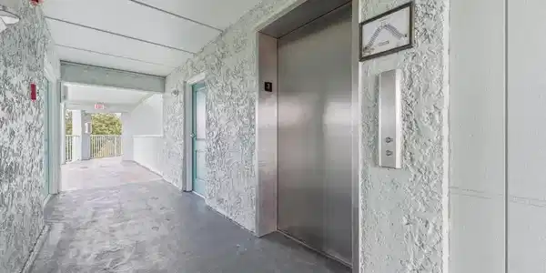 Image 3: Corridor featuring elevator and carpet Image 3: Corridor featuring elevator and carpet