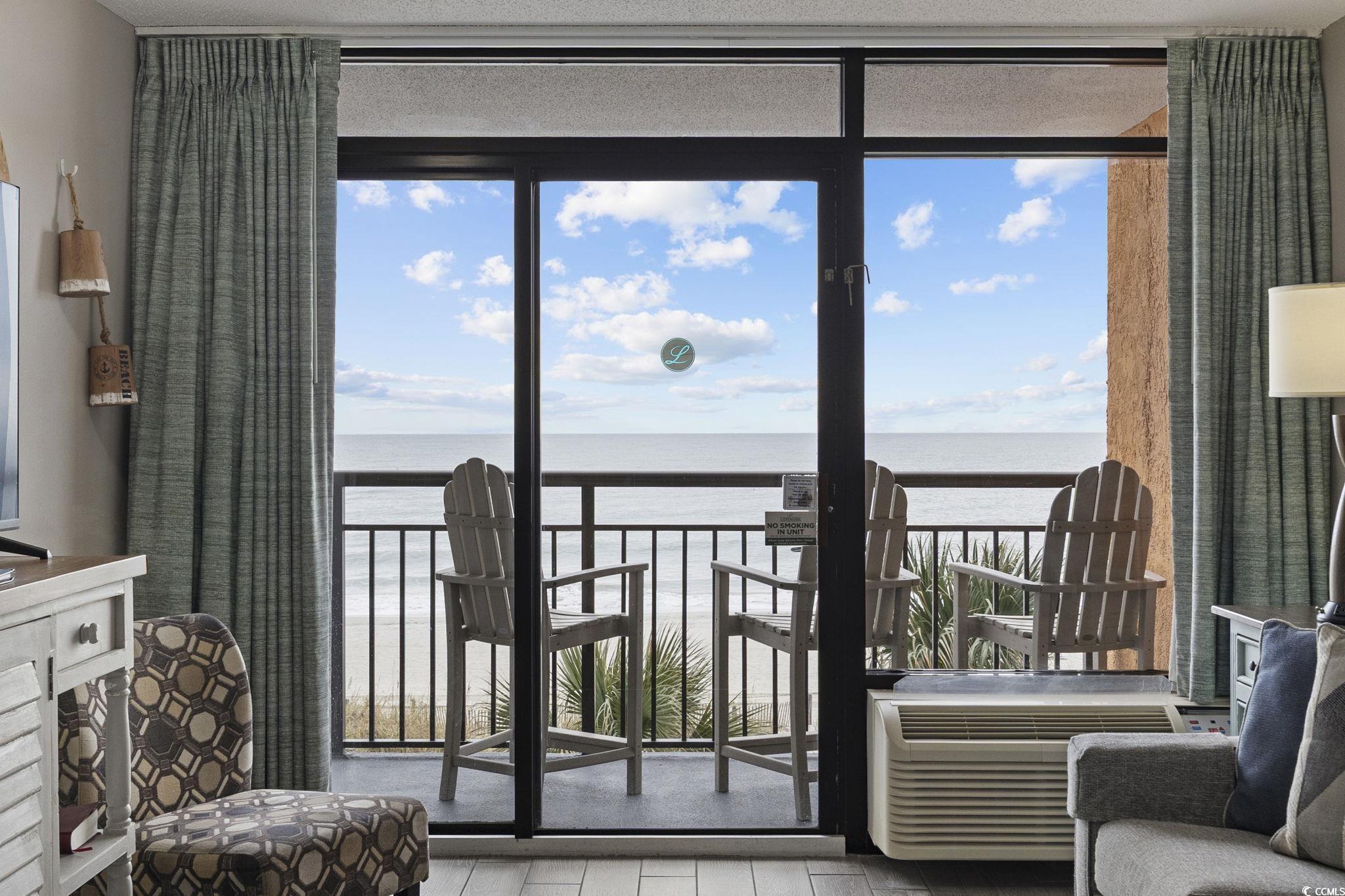Image 4: Oceanfront balcony with seating Image 4: Oceanfront balcony with seating