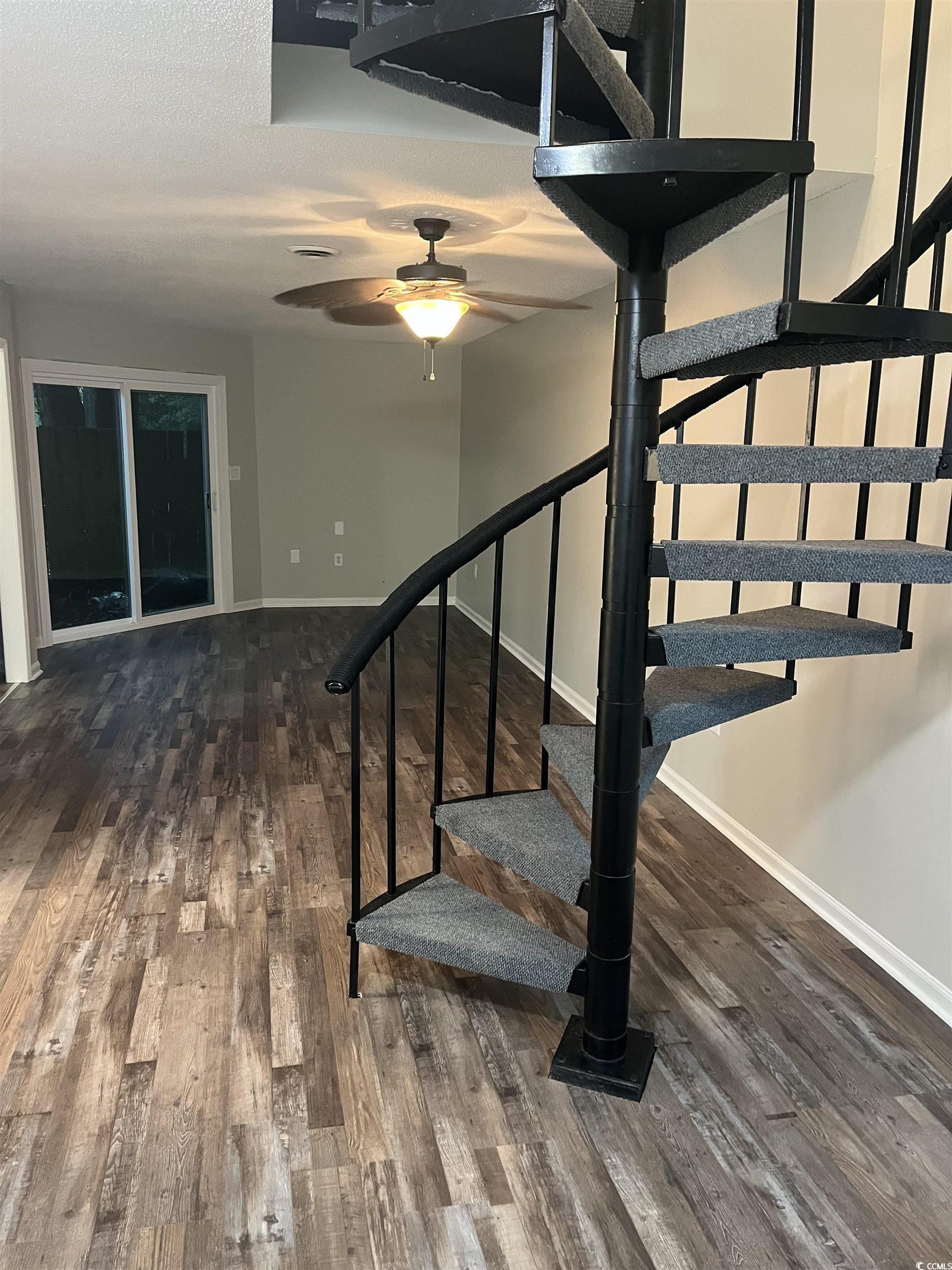 Image 3: Staircase featuring wood finished floors, ceiling Image 3: Staircase featuring wood finished floors, ceiling