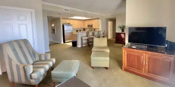 Image 2: Carpeted living room with a textured ceiling, ceil