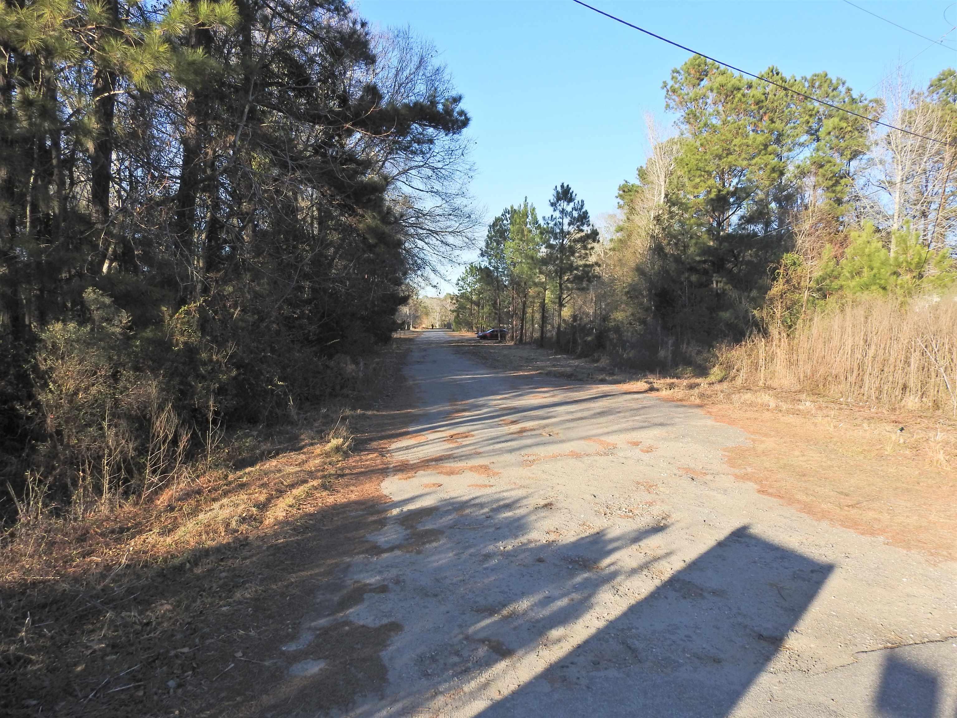 Image 3: View of dirt / gravel road Image 3: View of dirt / gravel road