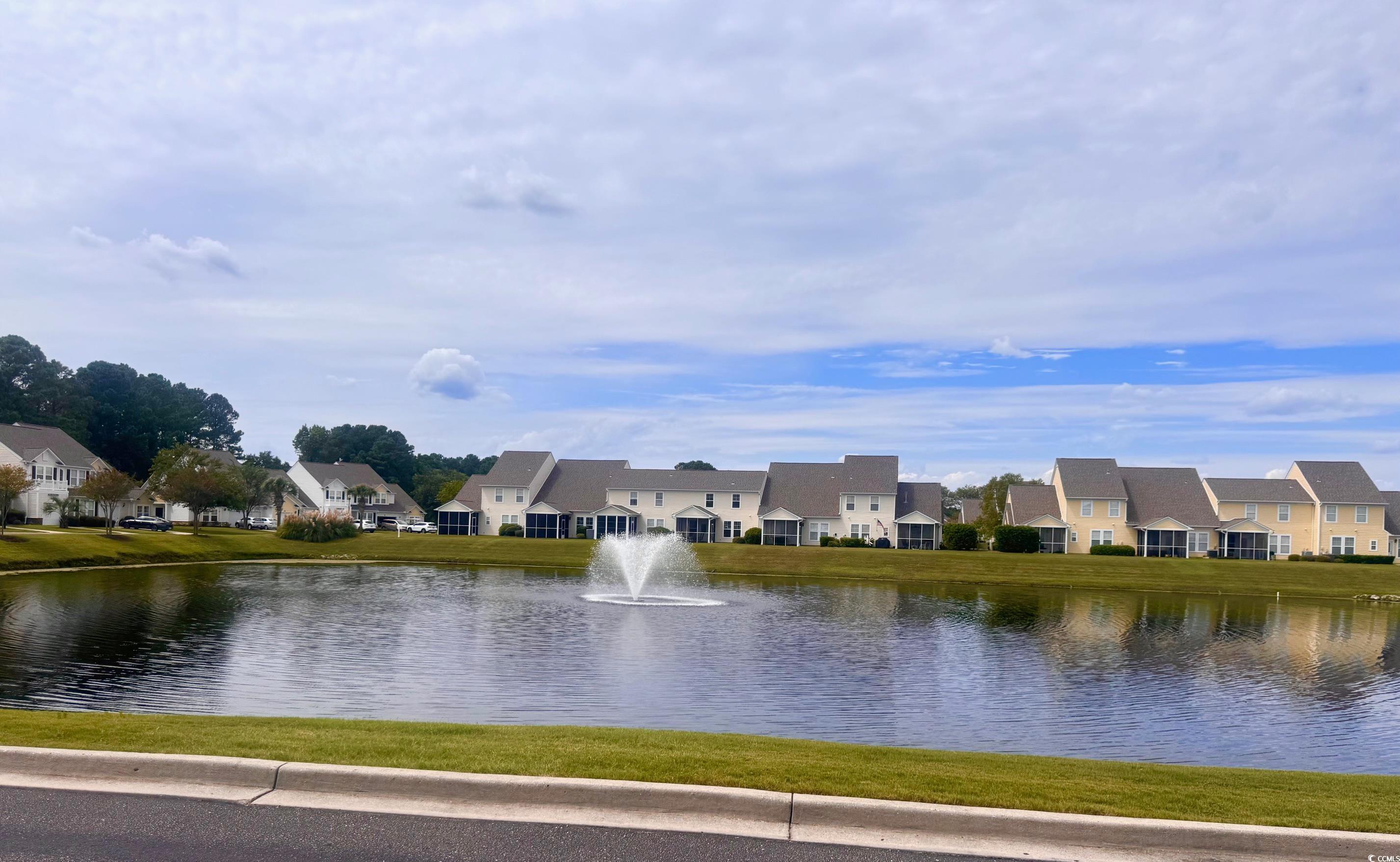 Image 2: Water view with nearby suburban area