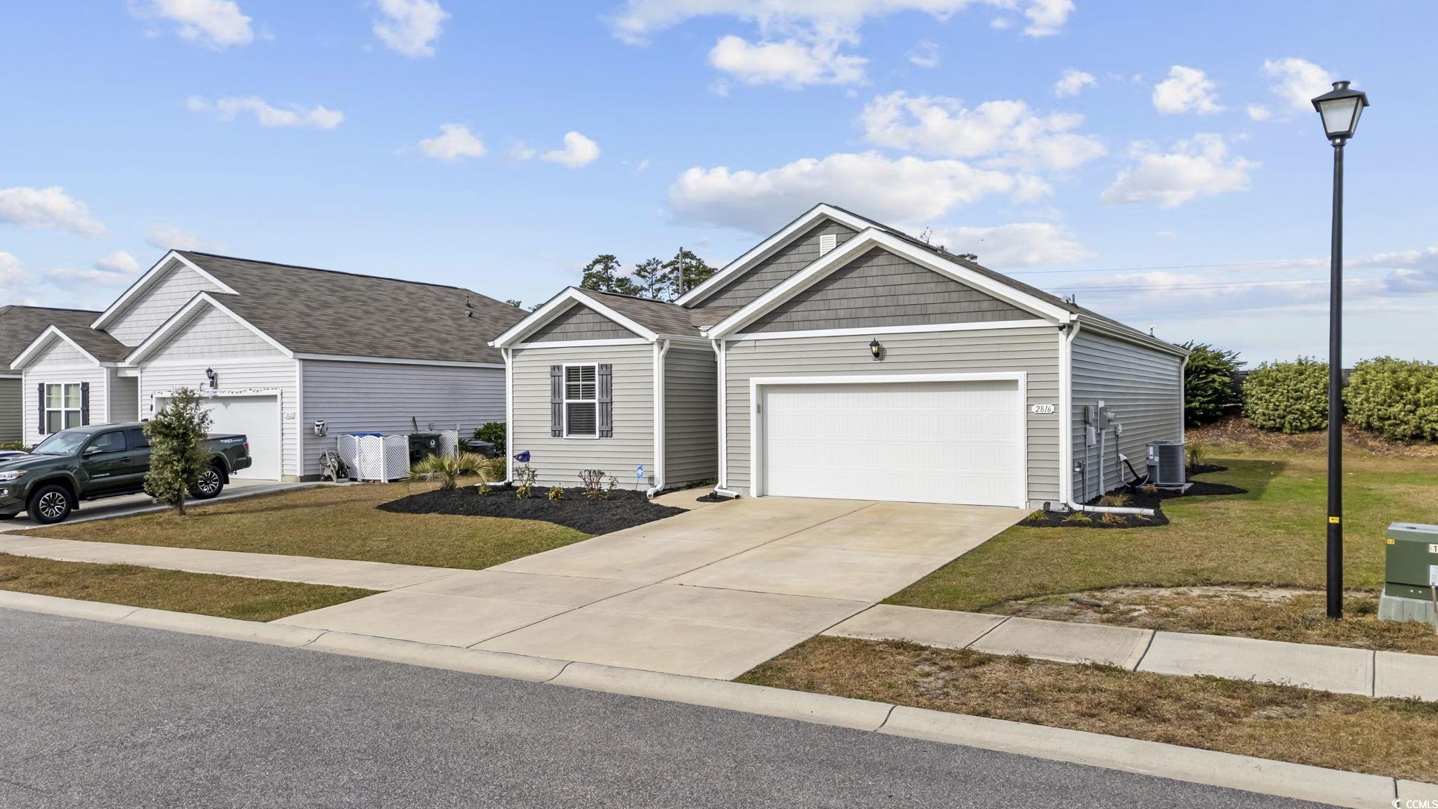 Image 2: View of front of property with concrete driveway, Image 2: View of front of property with concrete driveway,
