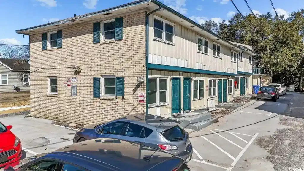 Image 1: View of front of property with uncovered parking a Image 1: View of front of property with uncovered parking a