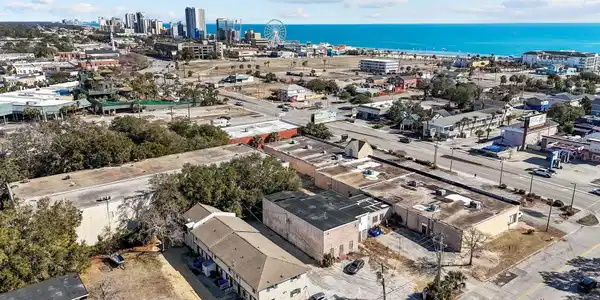 Image 2: Aerial view of skyline and a large body of water Image 2: Aerial view of skyline and a large body of water