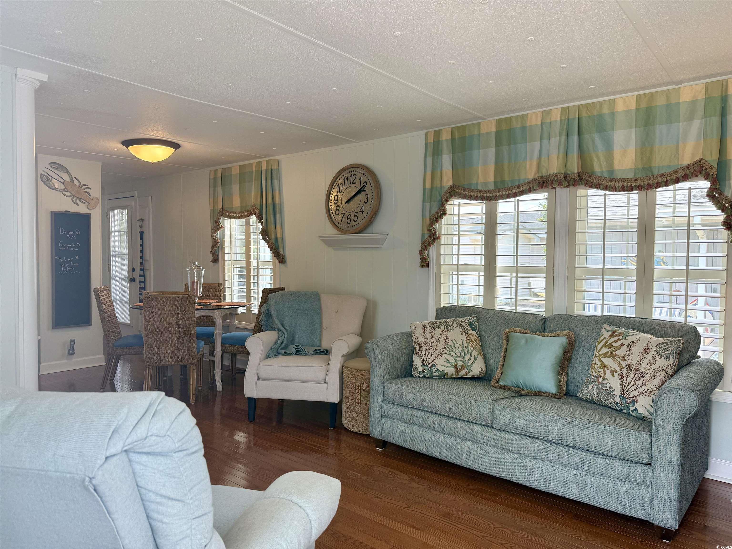 Image 2: Living area with wood finished floors Image 2: Living area with wood finished floors
