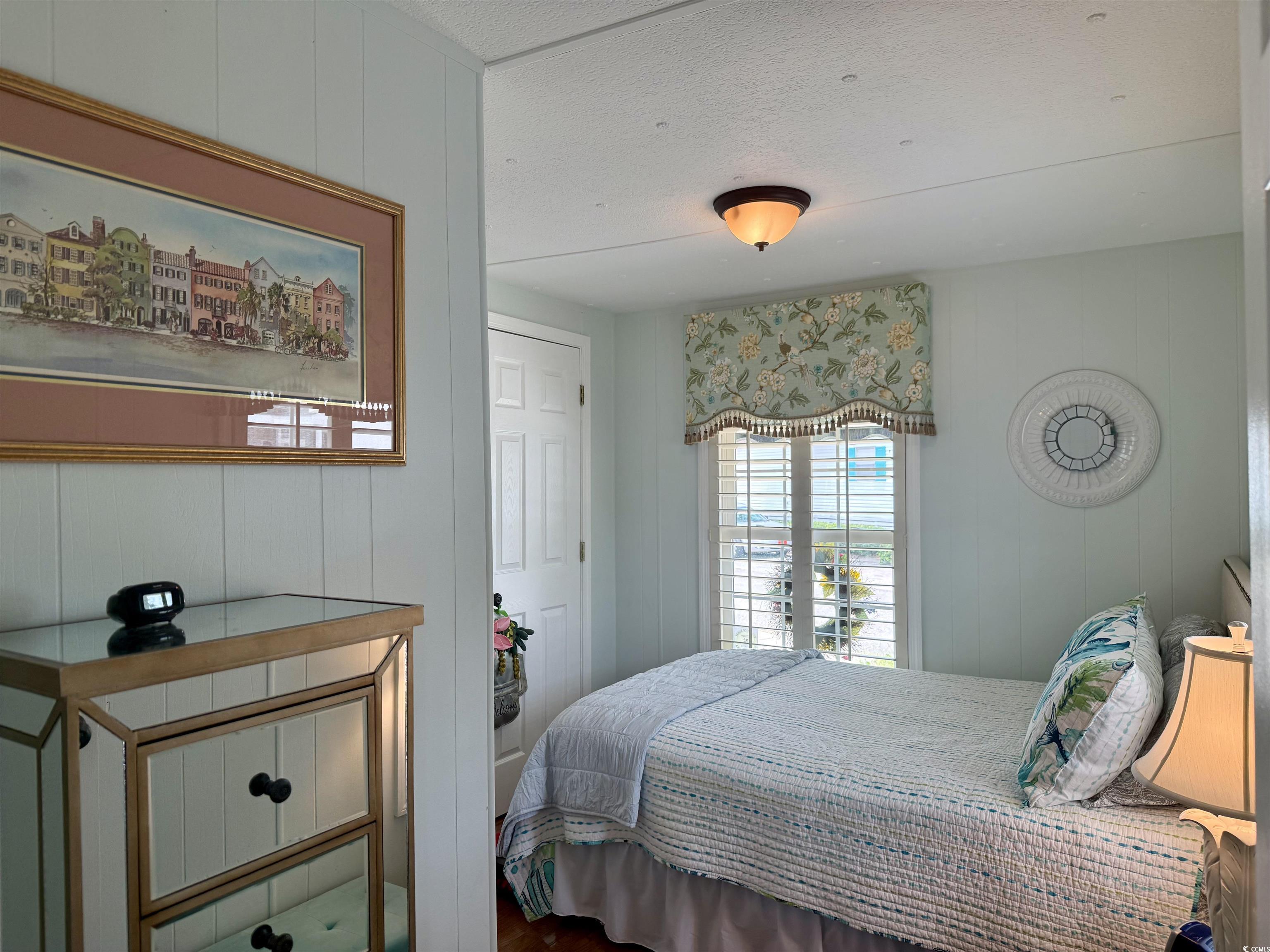 Image 3: Bedroom featuring a textured ceiling Image 3: Bedroom featuring a textured ceiling