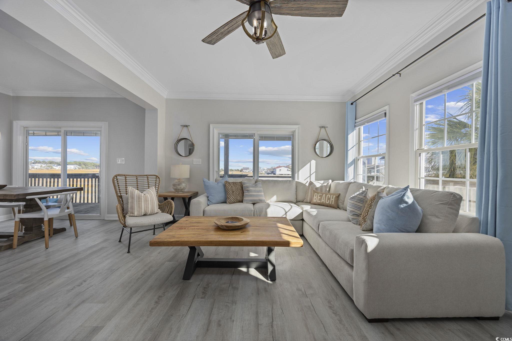 Image 3: Living room with plenty of natural light, ornament