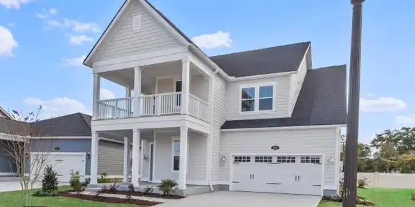 Image 2: View of front facade featuring covered porch, roof Image 2: View of front facade featuring covered porch, roof