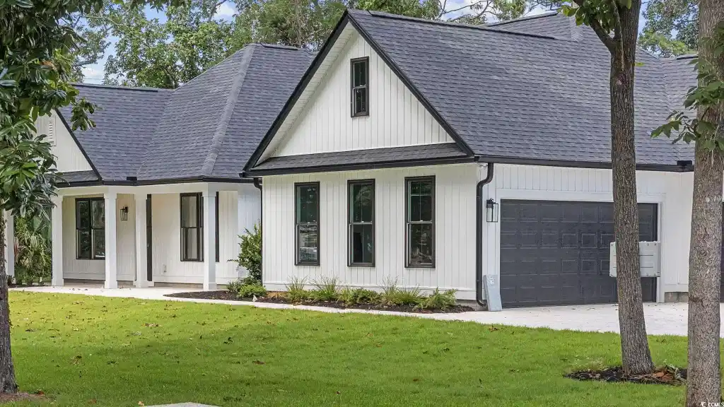 Image 1: Modern farmhouse featuring roof with shingles, an Image 1: Modern farmhouse featuring roof with shingles, an