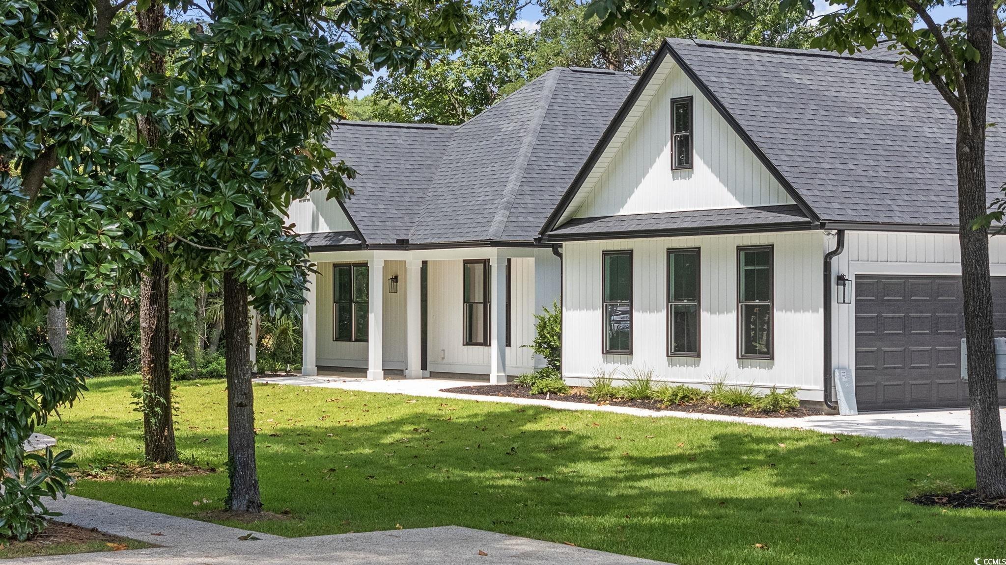 Image 2: Modern inspired farmhouse with roof with shingles, Image 2: Modern inspired farmhouse with roof with shingles,