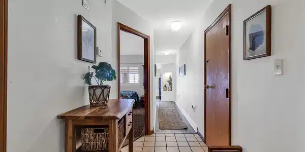 Image 2: Corridor featuring light tile patterned floors Image 2: Corridor featuring light tile patterned floors