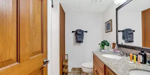 Image 4: Bathroom with tile patterned floors, vanity, and t Image 4: Bathroom with tile patterned floors, vanity, and t