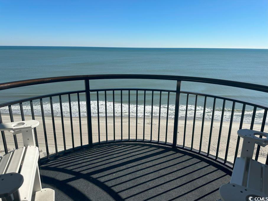 Image 2: Balcony featuring a water view and a beach view Image 2: Balcony featuring a water view and a beach view