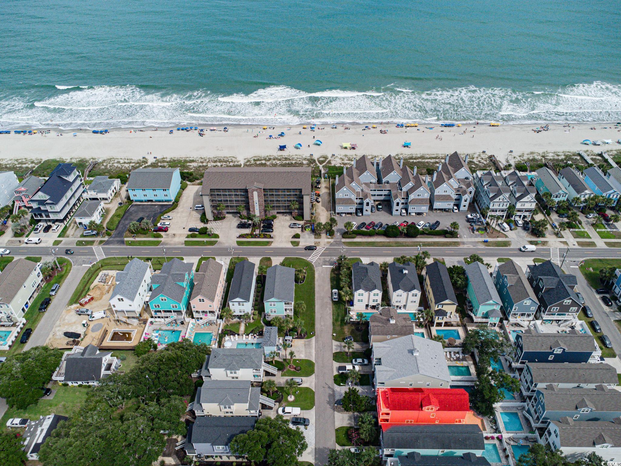 Image 2: Aerial perspective of suburban area featuring unen