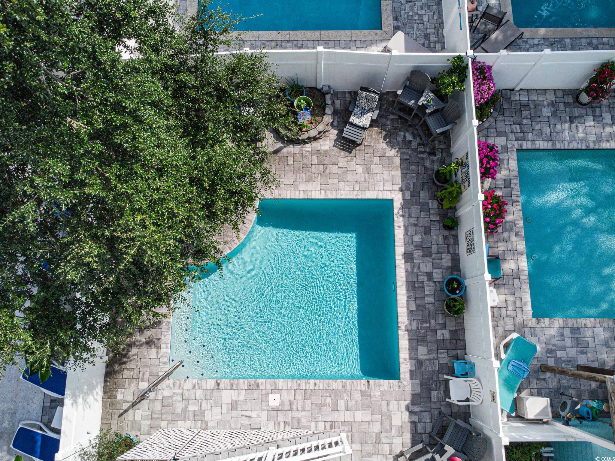 Image 3: Aerial view of a pool