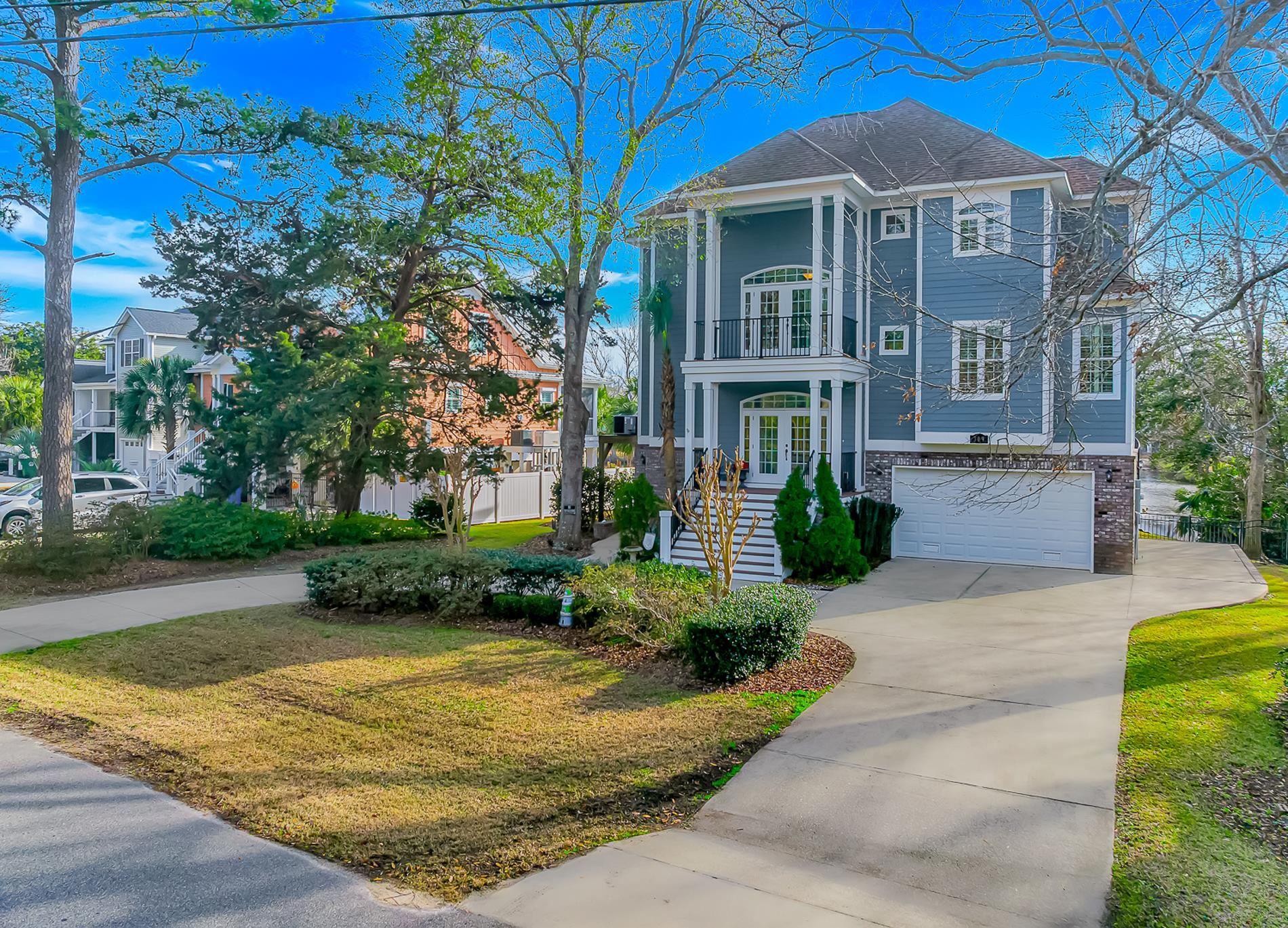 Image 2: View of front of property featuring french doors,