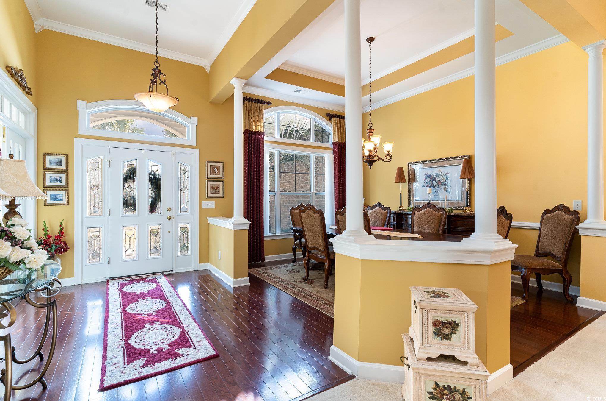 Image 4: The Front Entrance/Foyer features a custom front d
