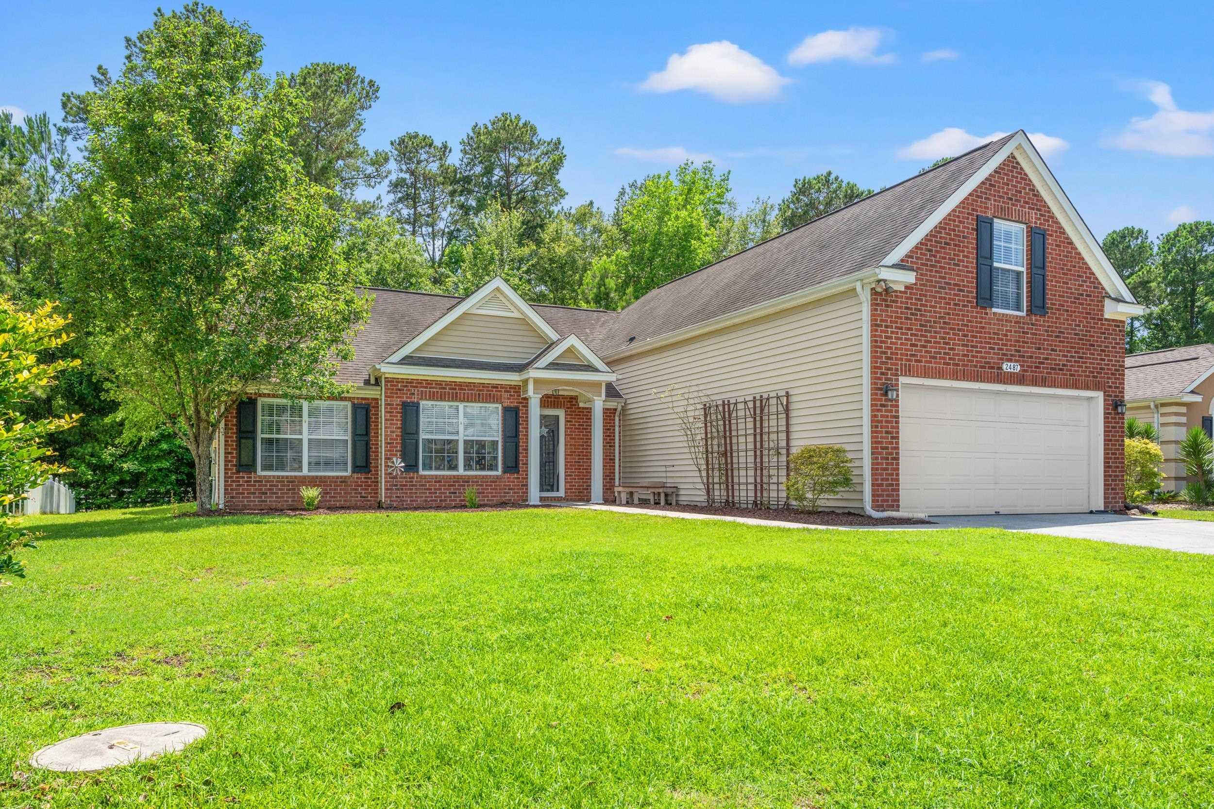 Image 3: View of front of house with a front lawn, driveway Image 3: View of front of house with a front lawn, driveway