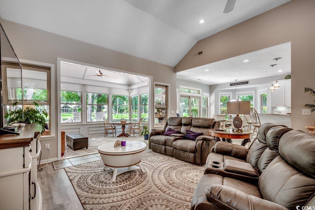 Image 3: Living room featuring ceiling fan, light wood-type Image 3: Living room featuring ceiling fan, light wood-type