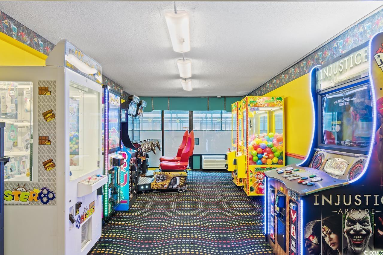 Image 2: Playroom featuring carpet flooring, a textured cei Image 2: Playroom featuring carpet flooring, a textured cei