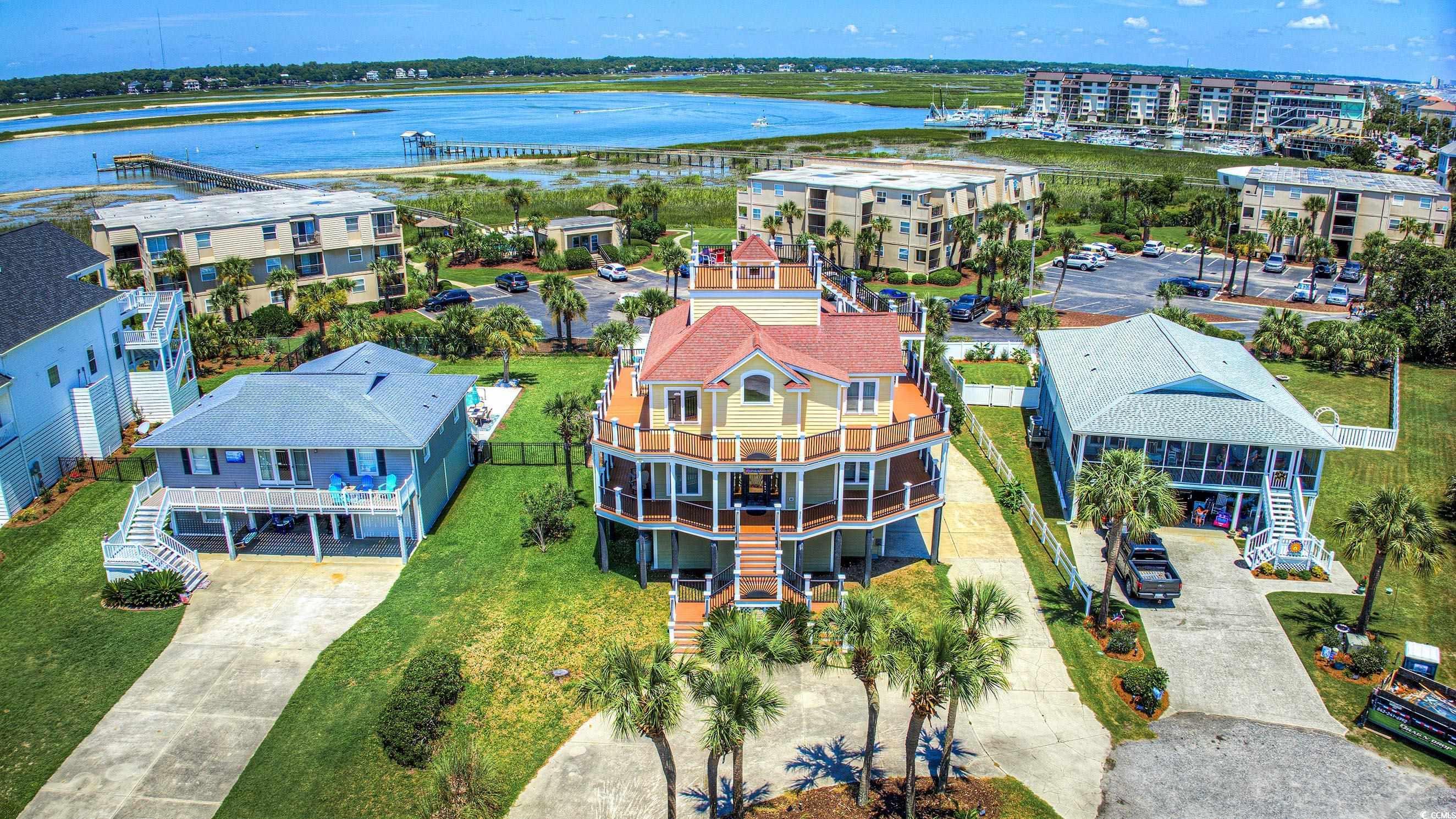 Image 1: Bird's eye view of a nearby body of water