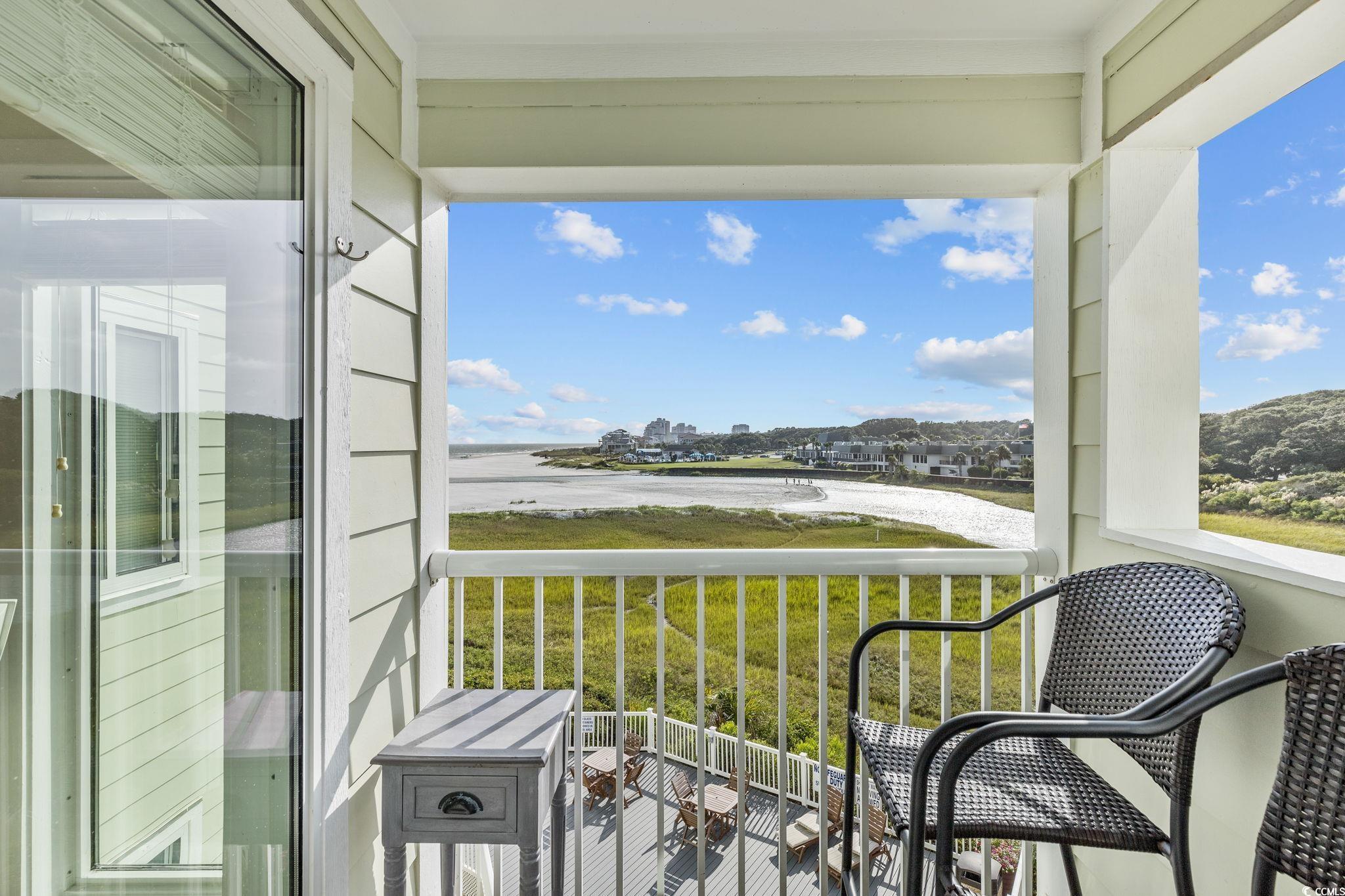 Image 3: Balcony featuring a water view Image 3: Balcony featuring a water view