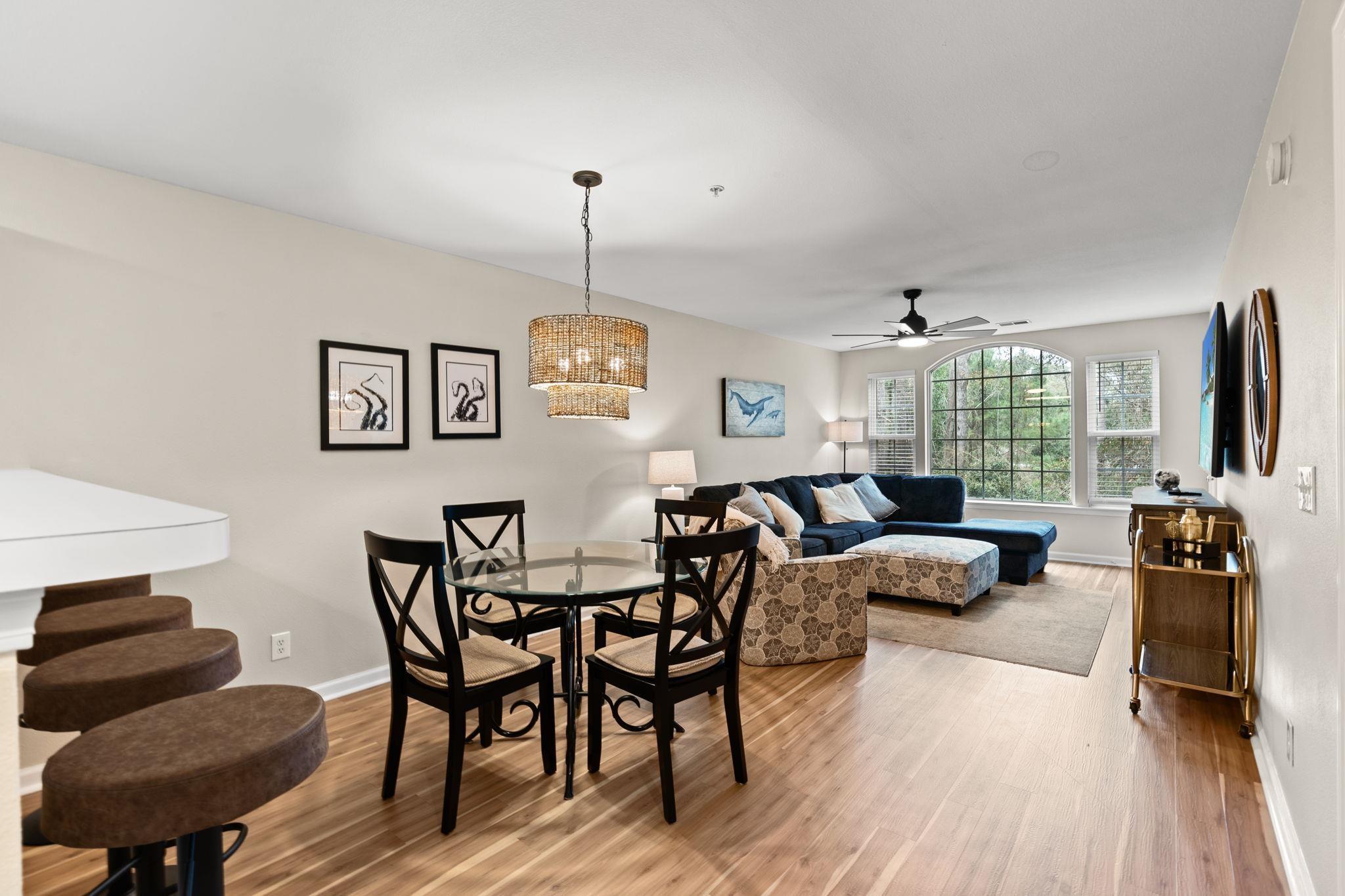 Image 4: Kitchen with white appliances, open floor plan, a Image 4: Kitchen with white appliances, open floor plan, a