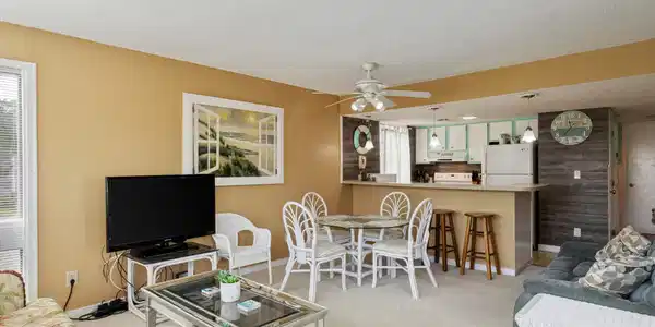 Image 4: Living room with a ceiling fan, light colored carp Image 4: Living room with a ceiling fan, light colored carp