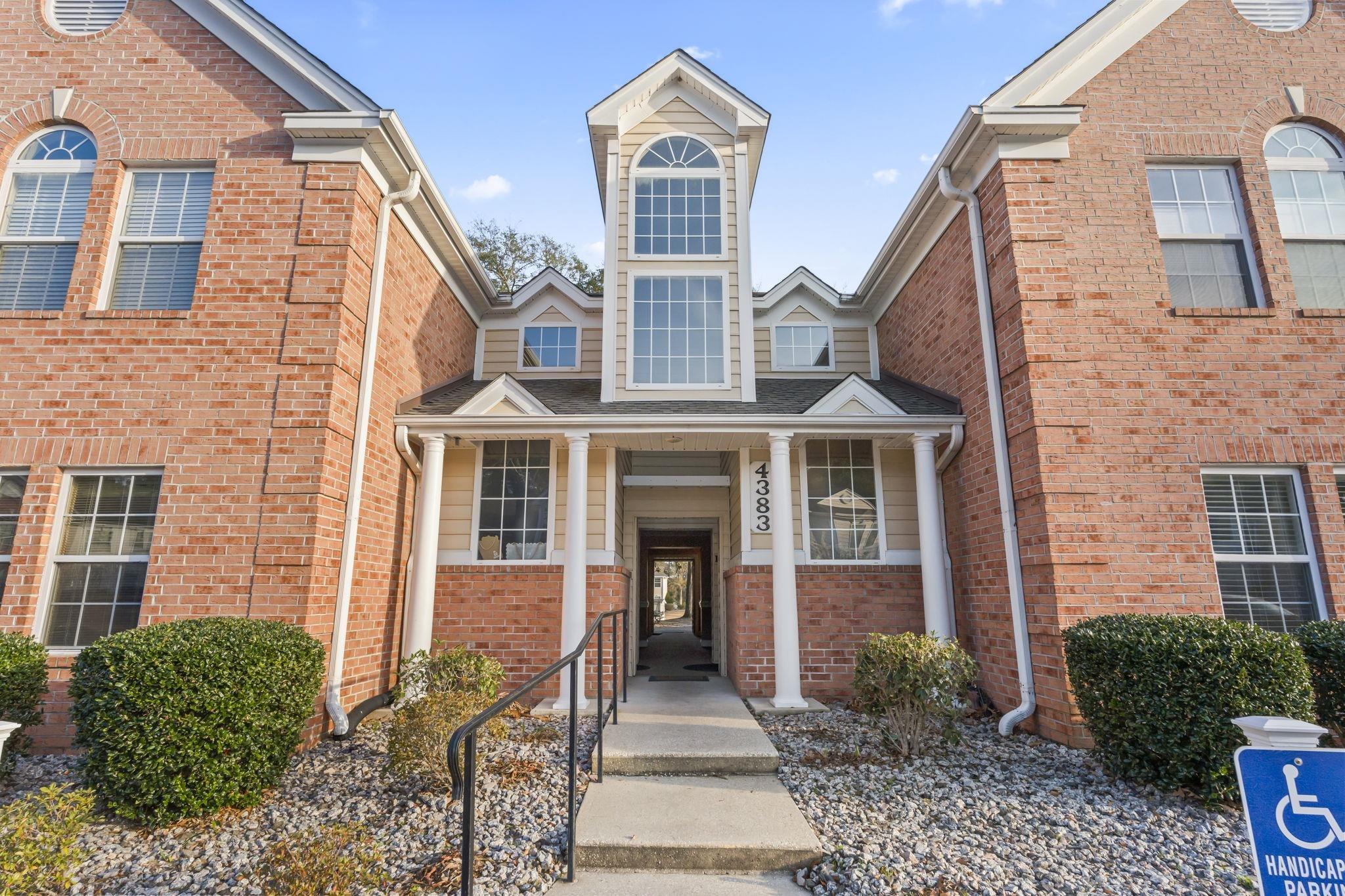 Image 4: View of front of property featuring brick siding a Image 4: View of front of property featuring brick siding a