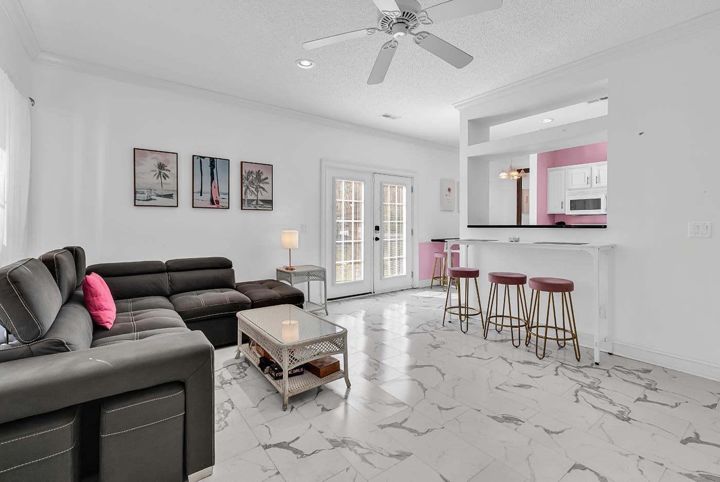 Image 3: Living area with crown molding, a textured ceiling Image 3: Living area with crown molding, a textured ceiling