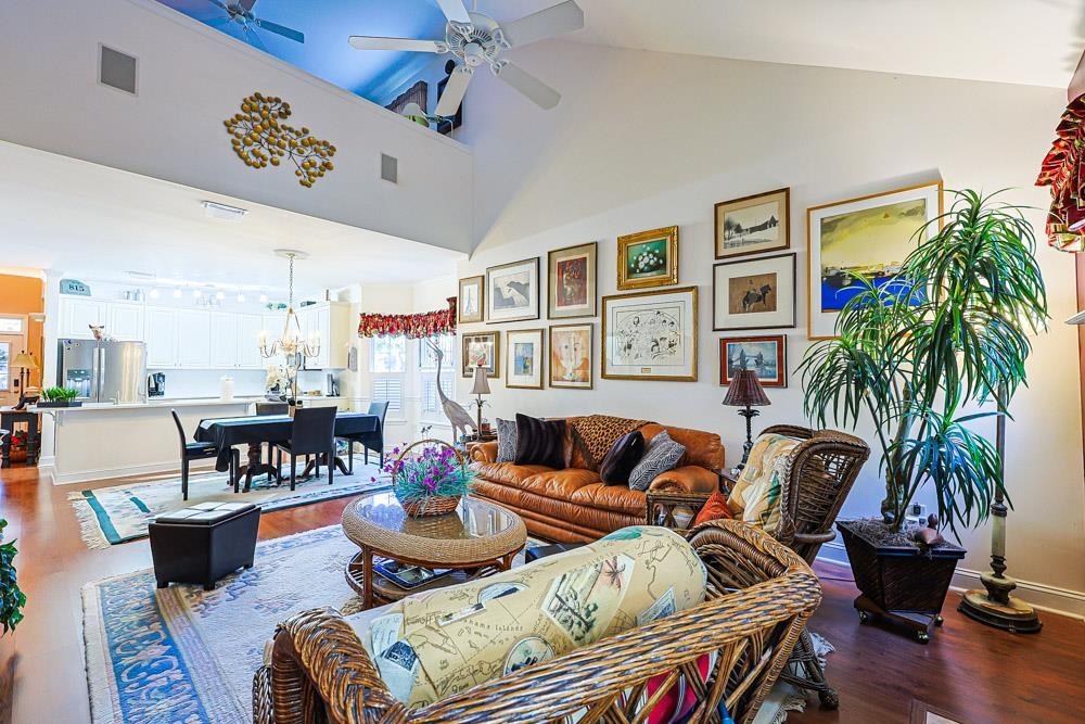 Image 2: Living area featuring wood finished floors, high v Image 2: Living area featuring wood finished floors, high v
