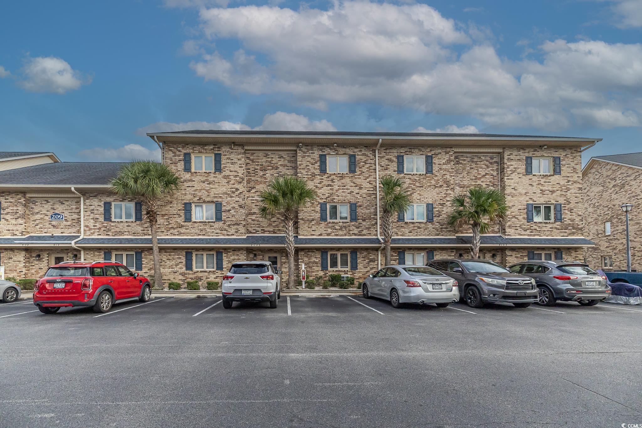 Image 1: View of property with uncovered parking Image 1: View of property with uncovered parking