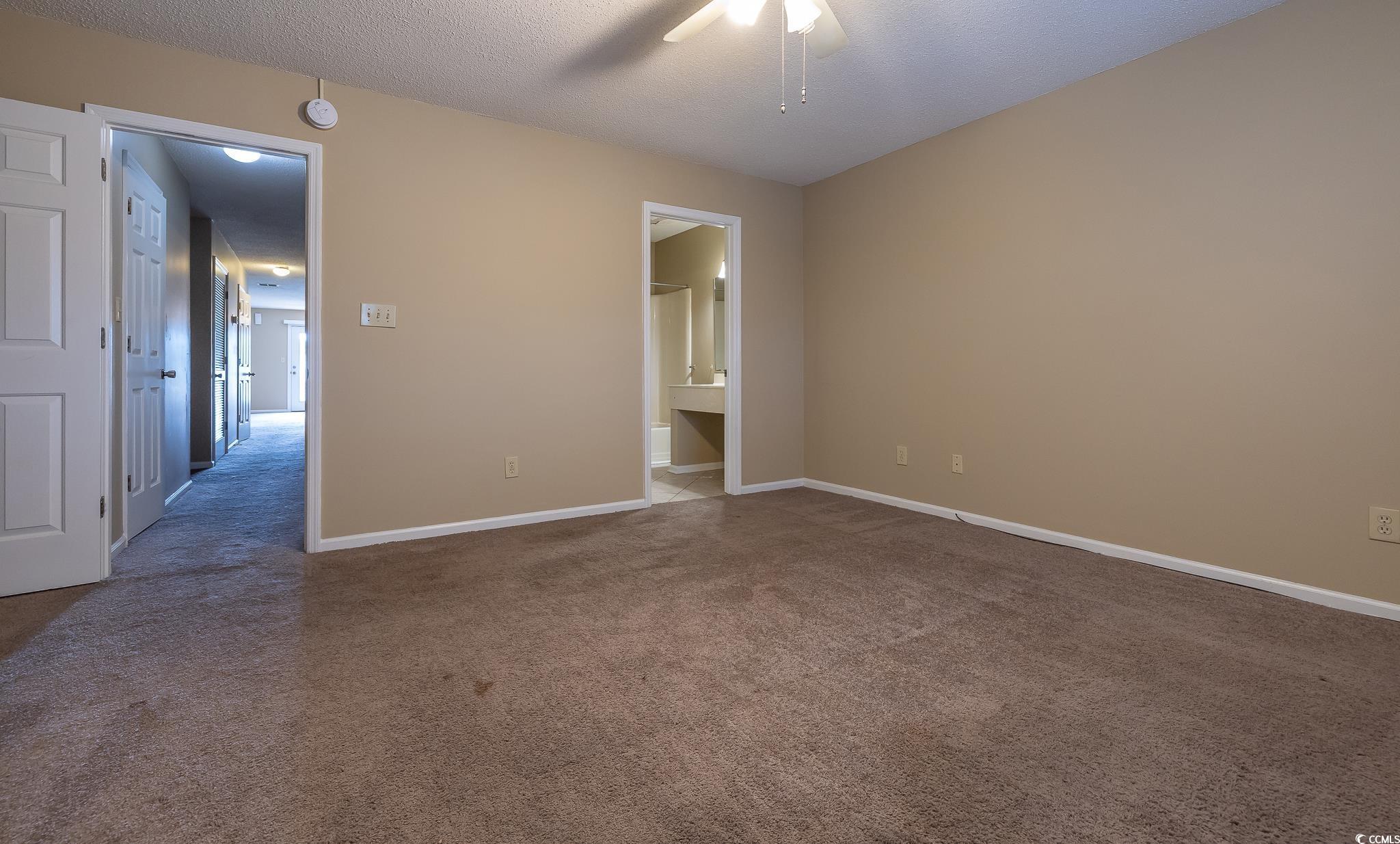 Image 2: Unfurnished bedroom featuring carpet flooring, a t Image 2: Unfurnished bedroom featuring carpet flooring, a t