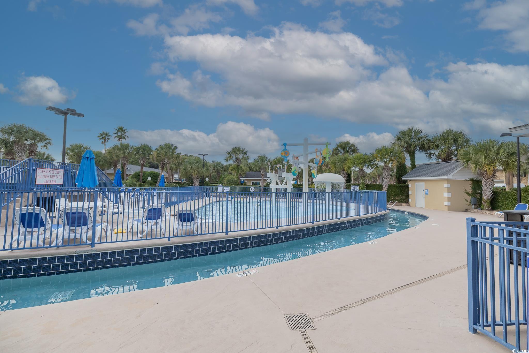 Image 3: Community pool featuring a patio area Image 3: Community pool featuring a patio area