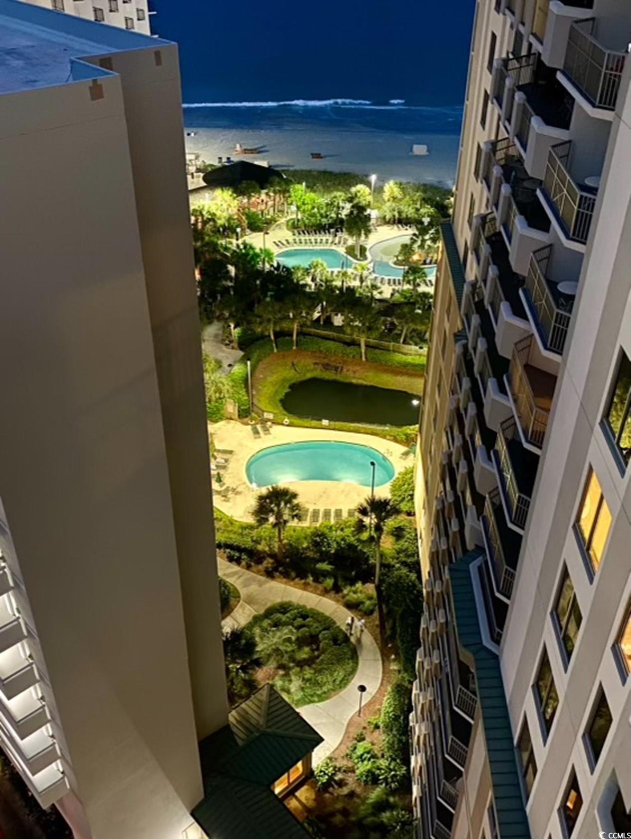 Image 3: View of pool with a water view Image 3: View of pool with a water view