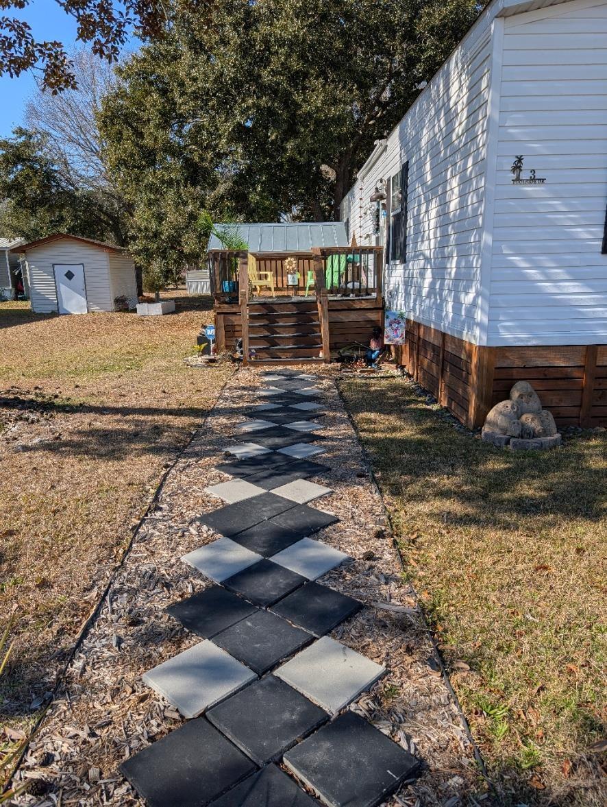 Image 2: Walk this path to the deck...then enter
