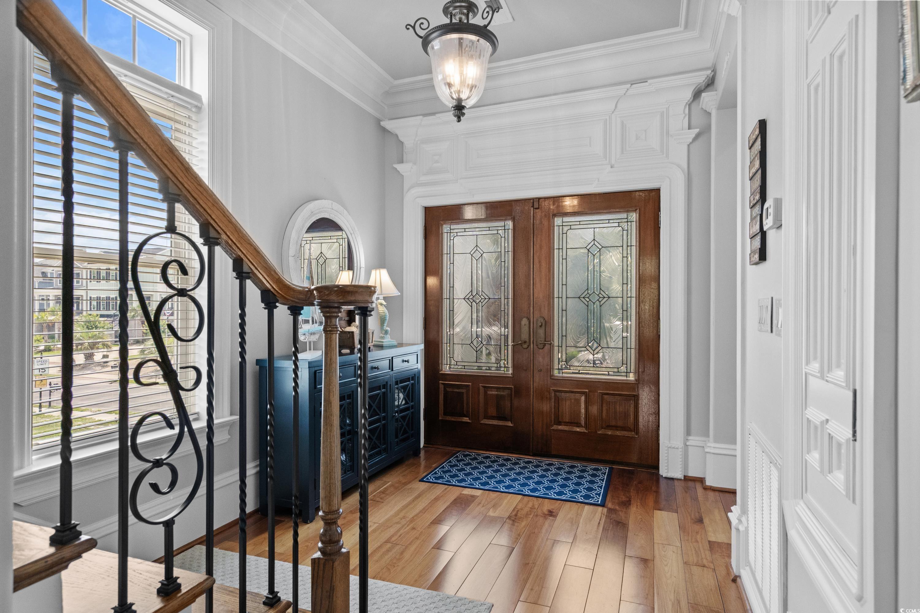 Image 3: Foyer featuring french doors, healthy amount of na