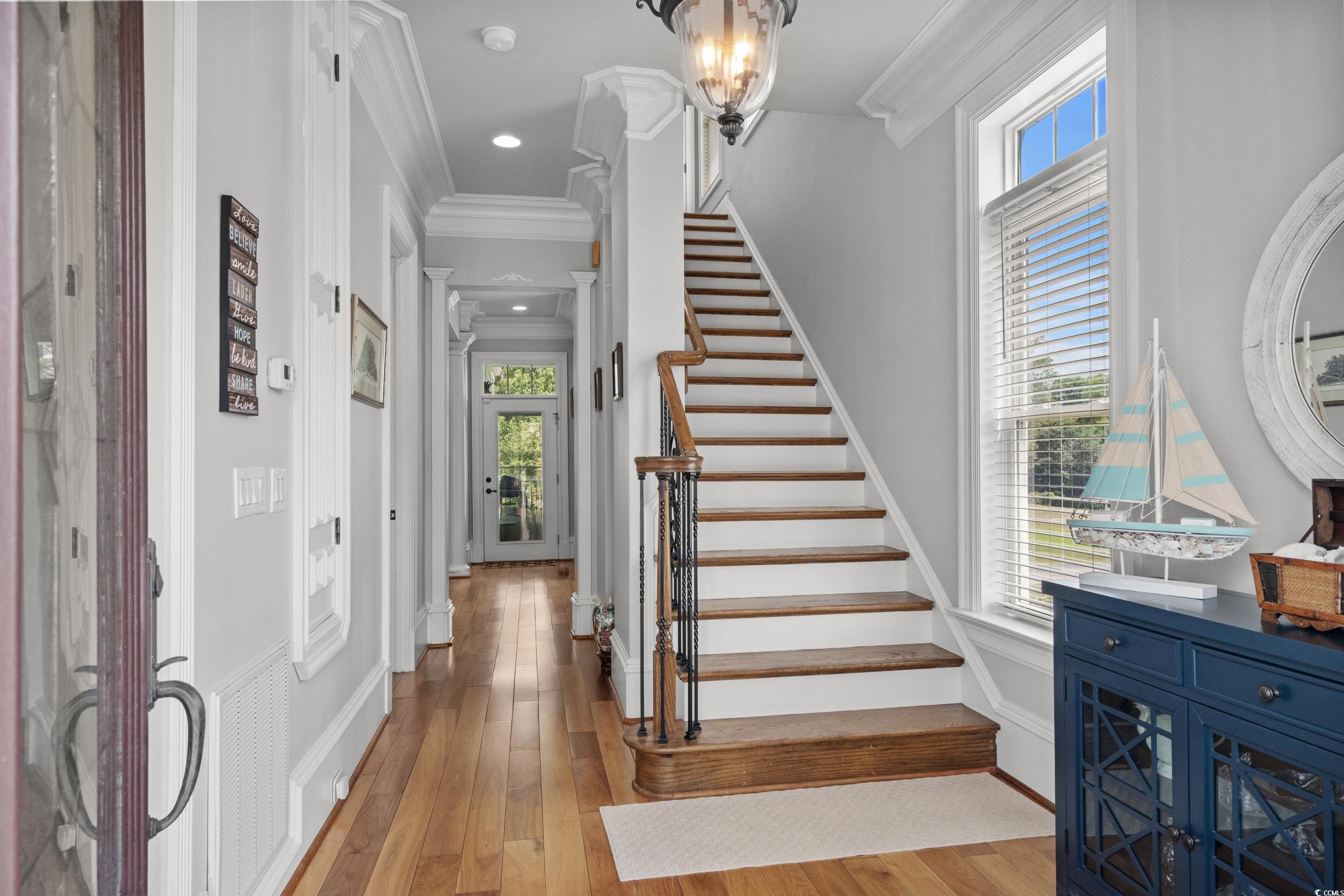 Image 4: Entrance foyer with plenty of natural light, ornam