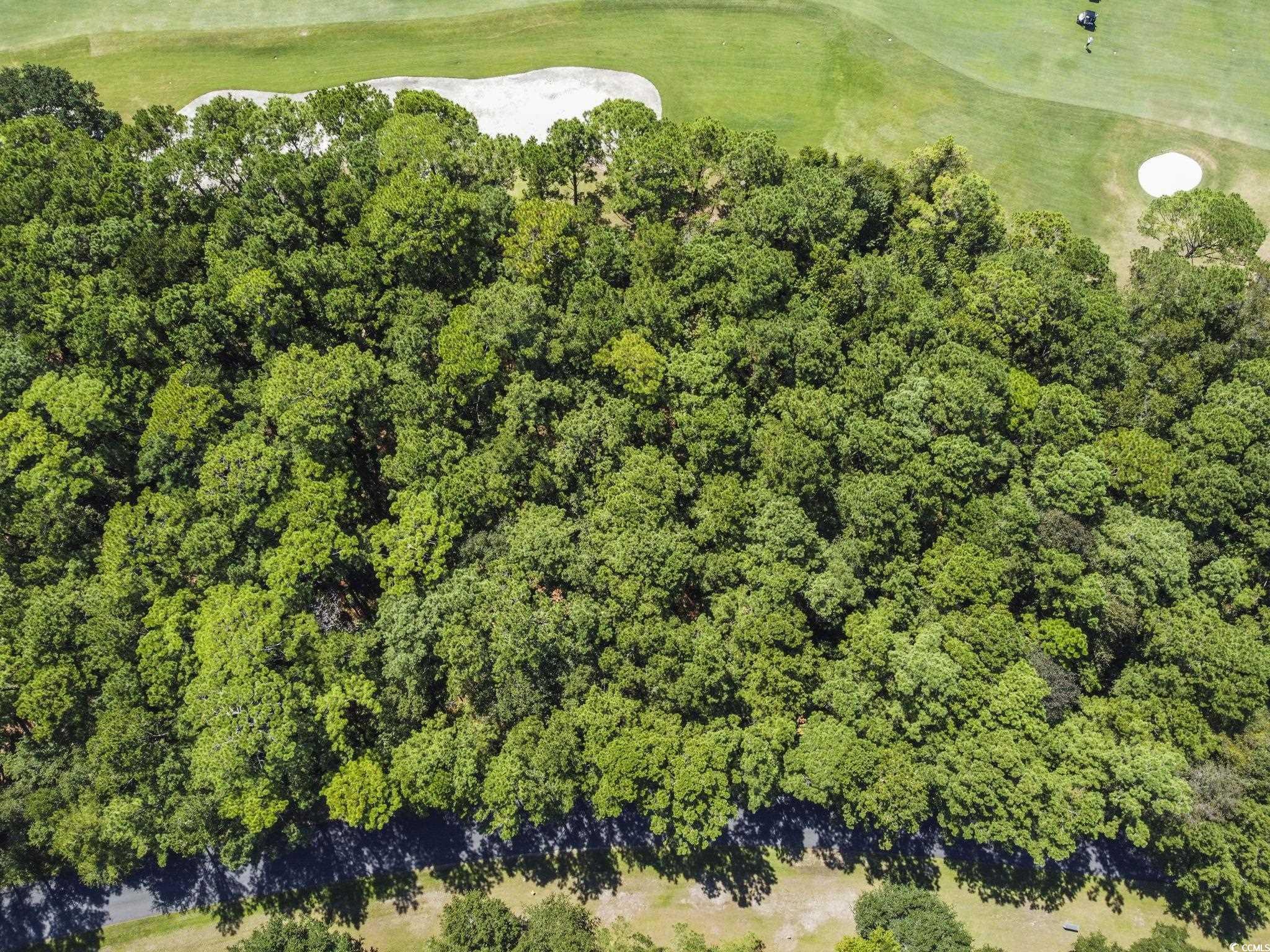 Image 2: View of property location with a golf club