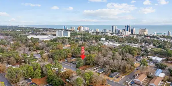 Image 4: Aerial overview of property's location featuring c