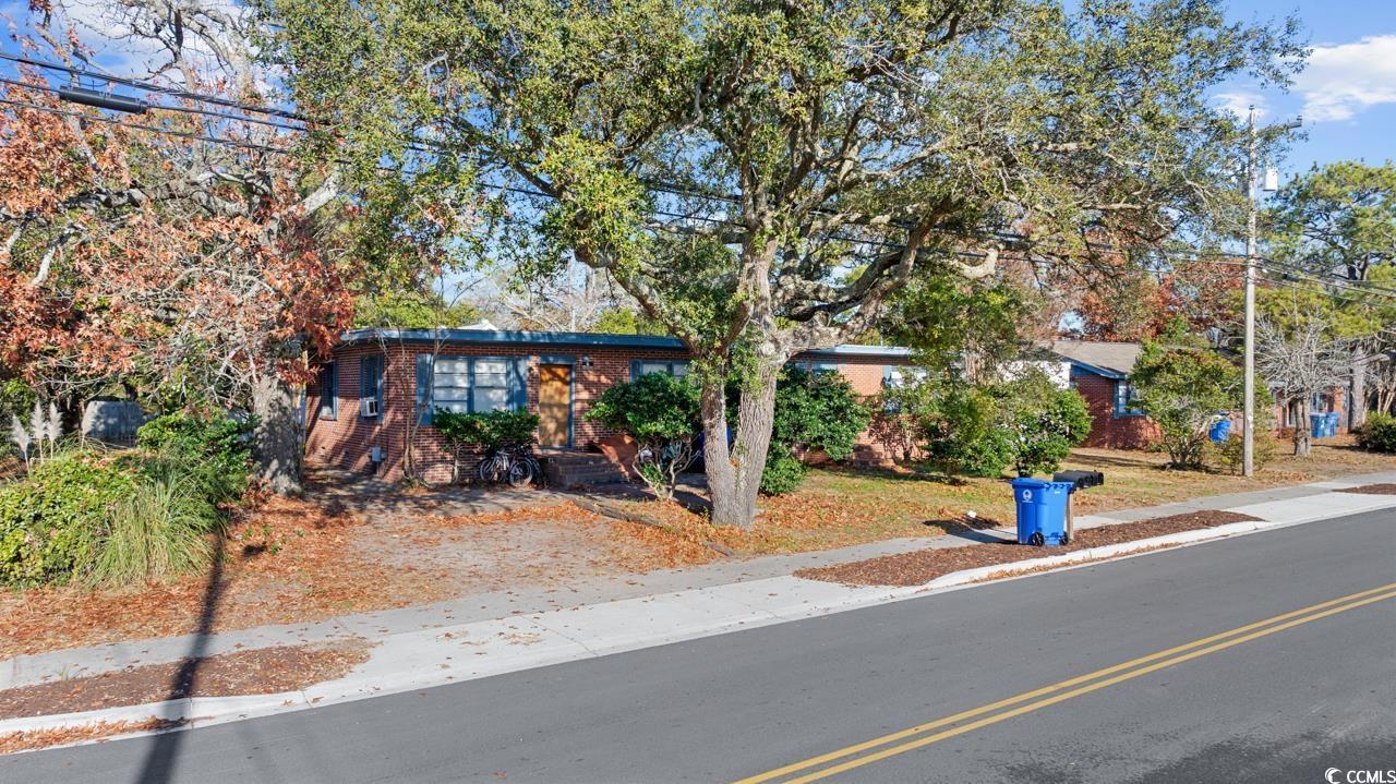 Image 2: View of front of house with brick siding Image 2: View of front of house with brick siding