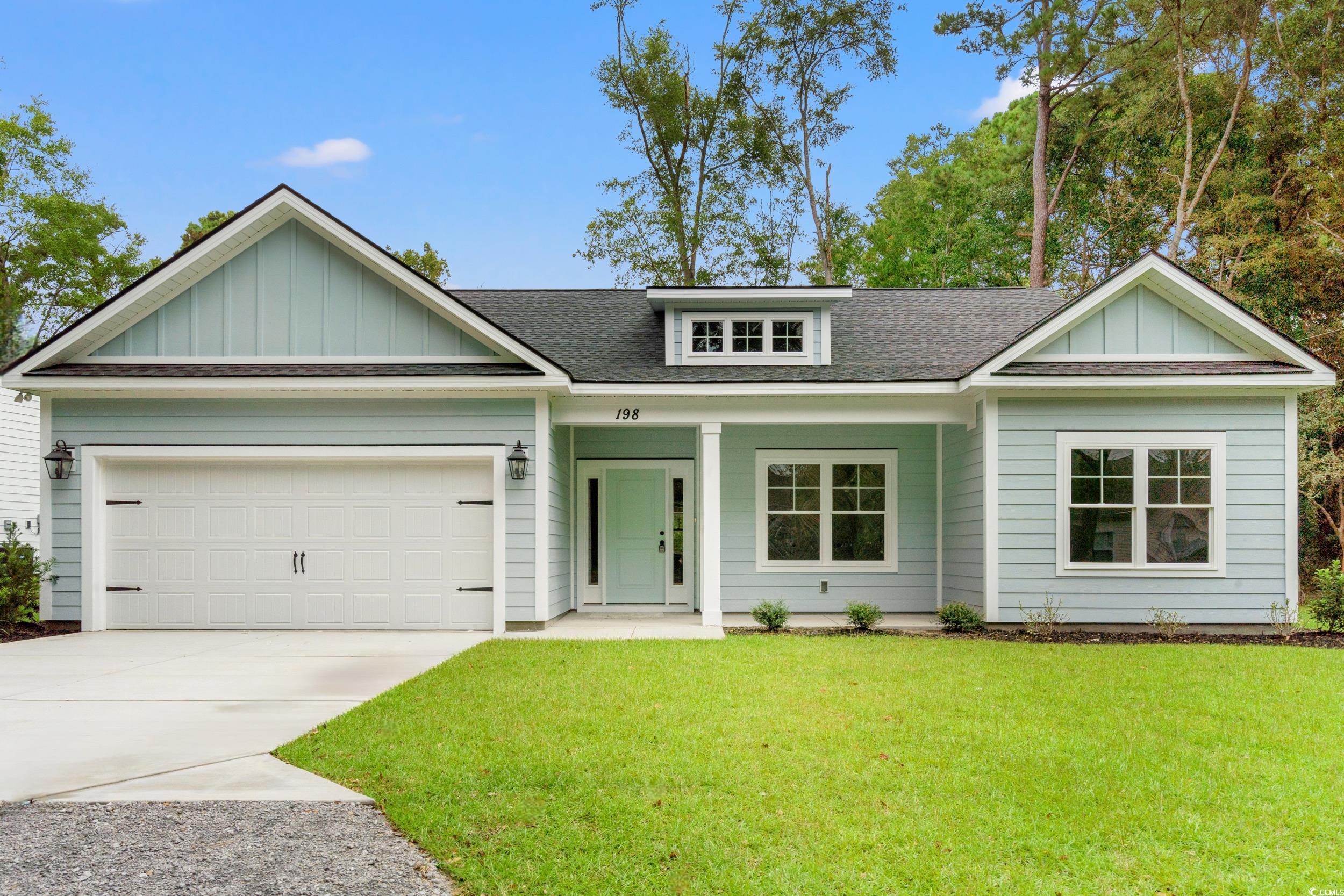 Image 1: View of front of property with a shingled roof, a Image 1: View of front of property with a shingled roof, a