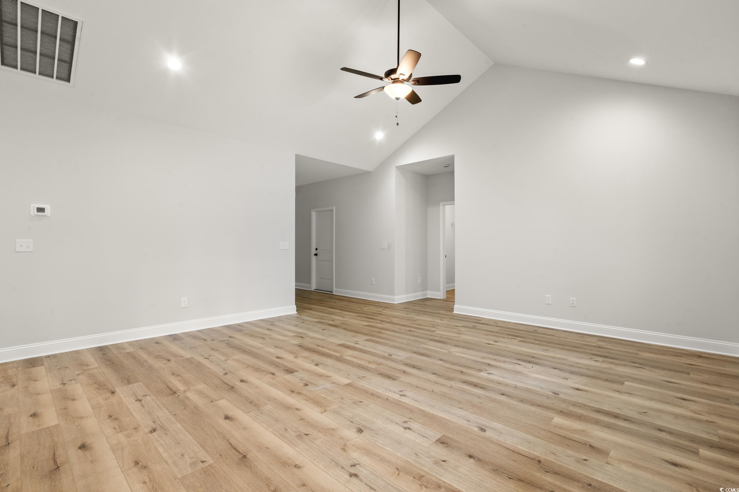 Image 3: Unfurnished living room with light wood-style floo Image 3: Unfurnished living room with light wood-style floo