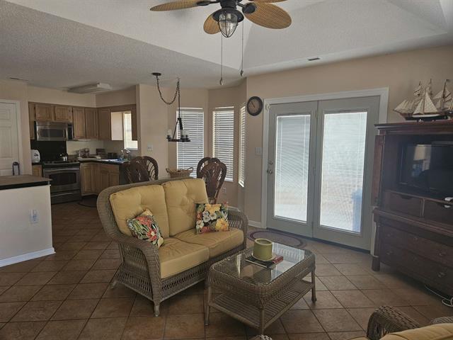 Image 2: Living area featuring plenty of natural light, lig Image 2: Living area featuring plenty of natural light, lig