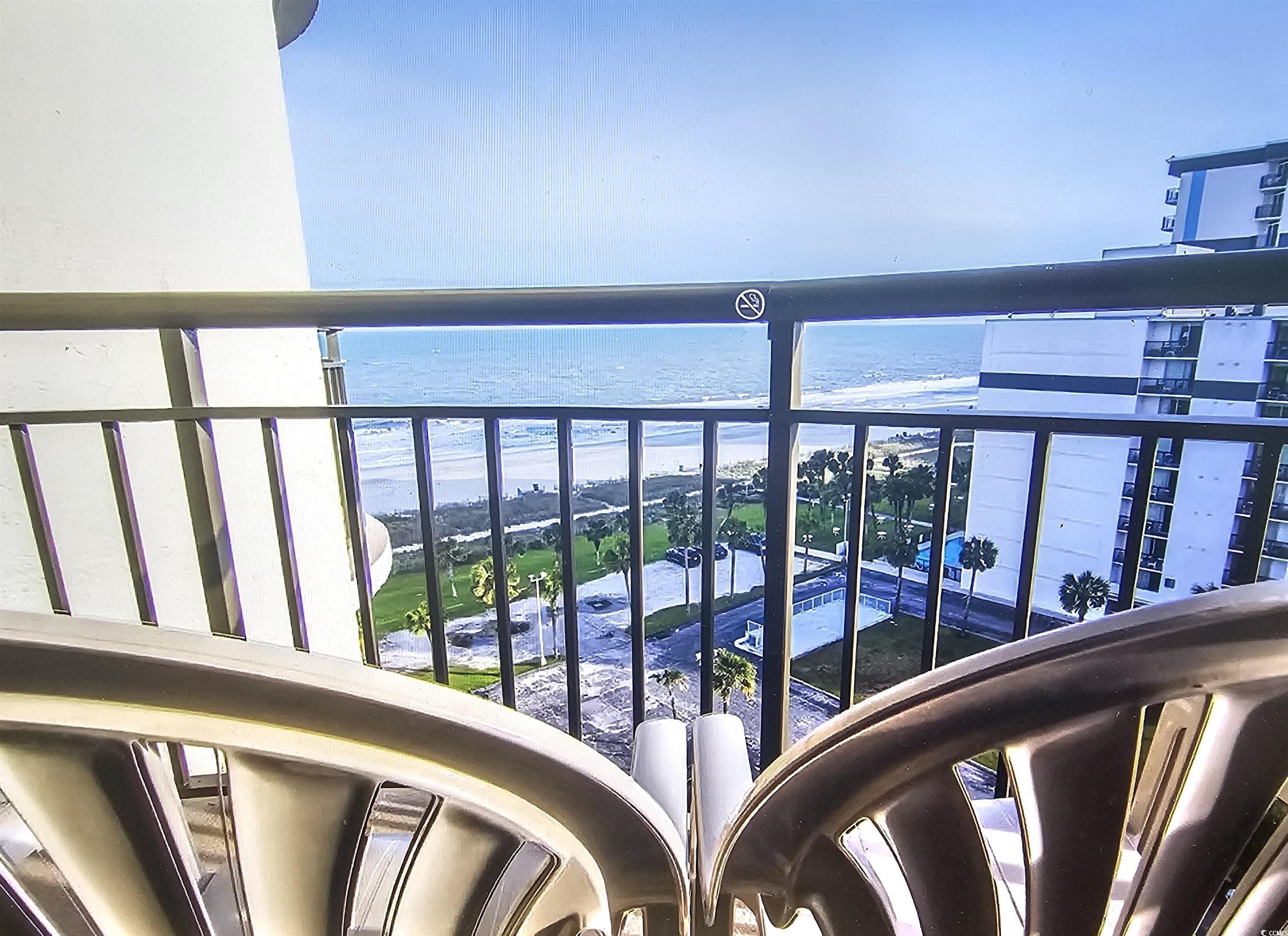 Image 2: Balcony featuring view of water and beach Image 2: Balcony featuring view of water and beach