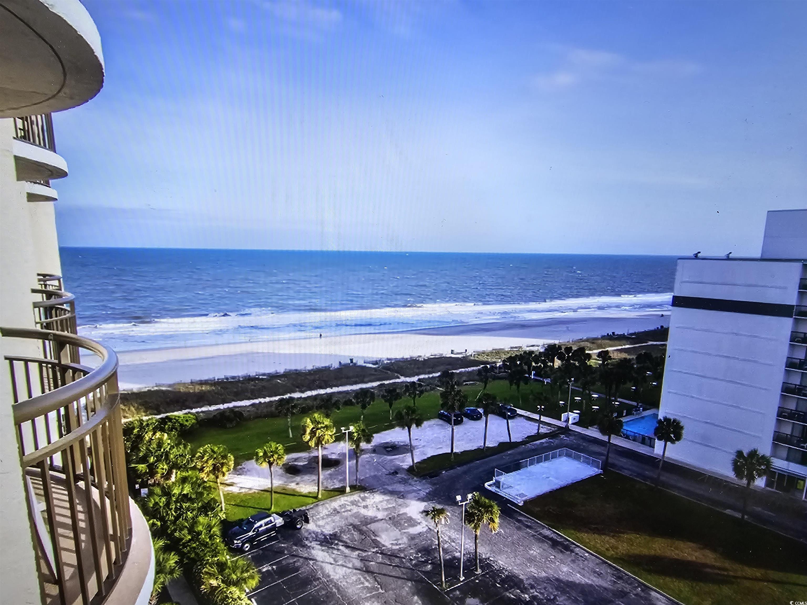 Image 3: Water view with local beach Image 3: Water view with local beach
