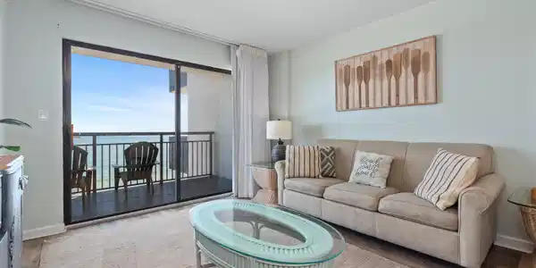 Image 4: Living room featuring wood finished floors and a w