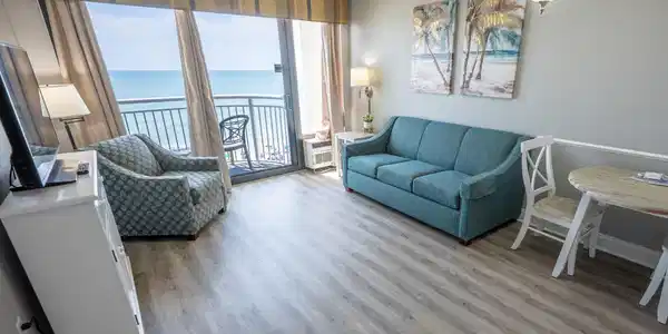 Image 4: Living room with a water view, wood-type flooring,