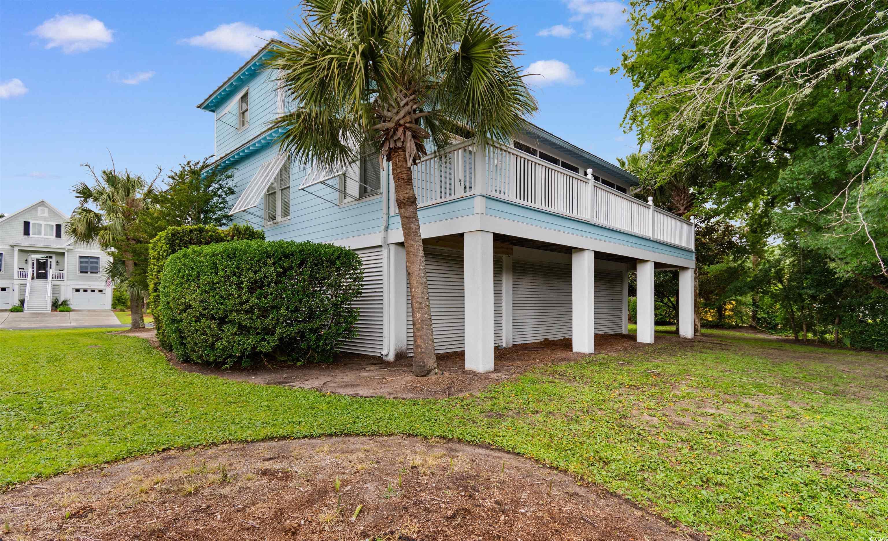 Image 2: View of property exterior featuring a yard Image 2: View of property exterior featuring a yard